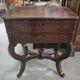 Dresser or vanity table from the Charles X / Empire period in mottled mahogany.