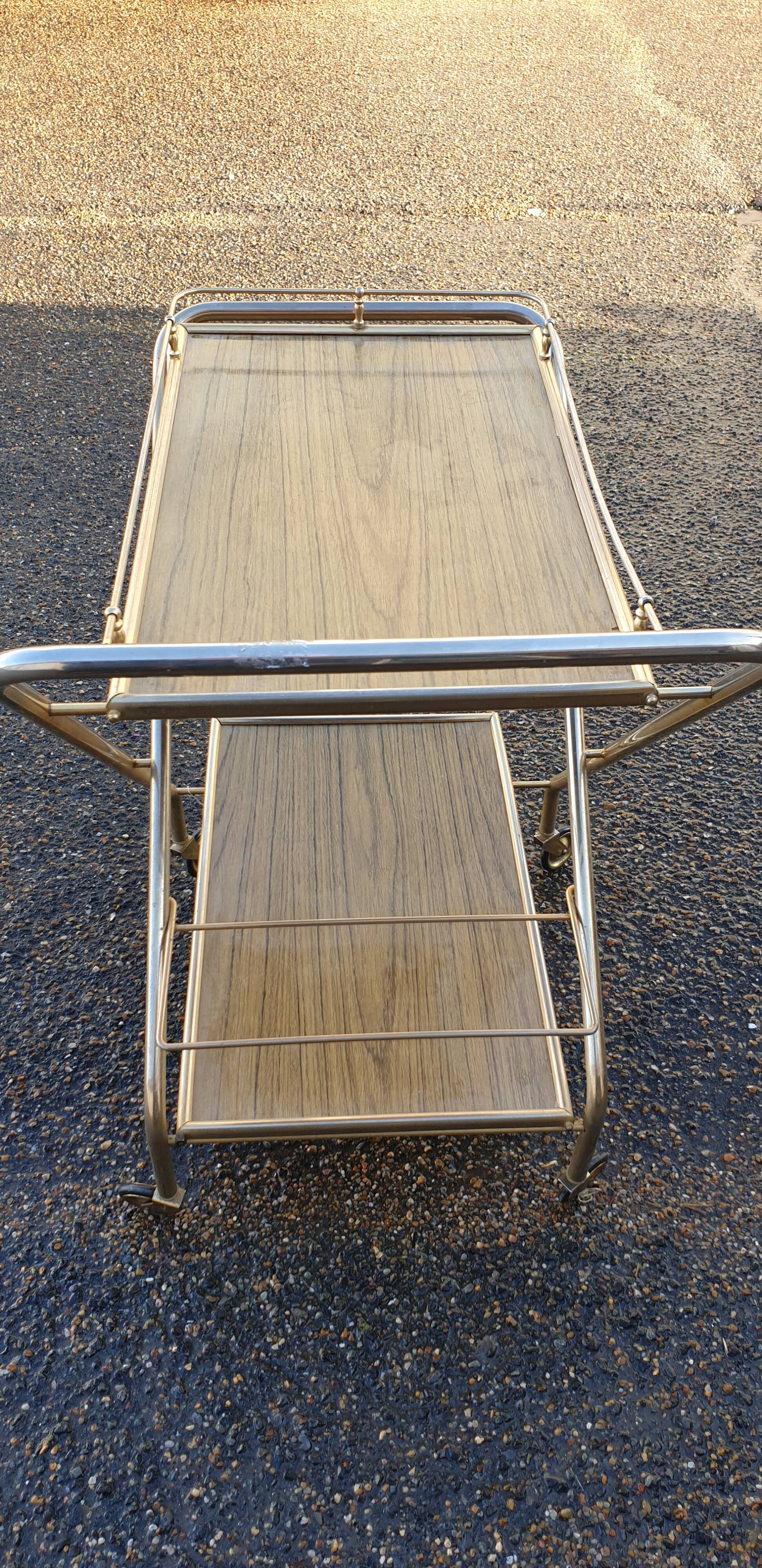 Vintage folding serving table on wheels