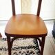 Set of 4 light wood bistro chairs stamped Baumann and Thonet.