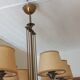 Vintage chandelier in gilded brass, chromed metal and plexiglass from the 1950s