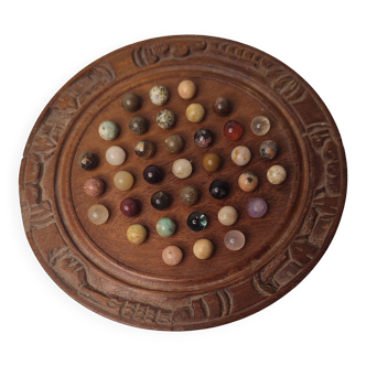 Malagasy solitaire in wood and 37 marbles, ethnic stones, decoration game