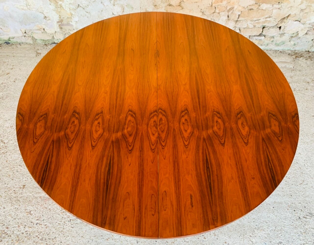 Extendable dining table with butterfly extensions in rosewood circa 60's