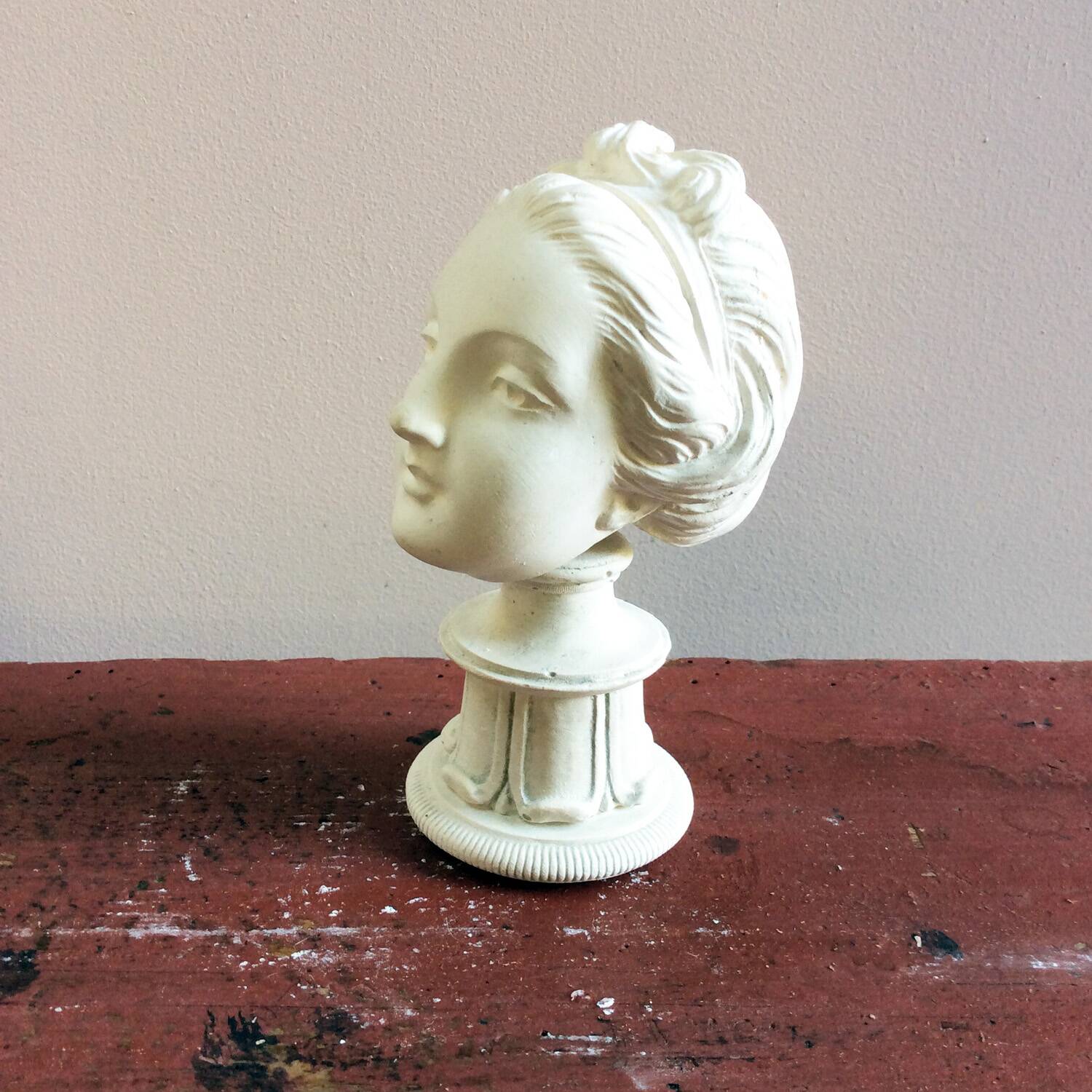 Plaster sculpture young woman with headband 1910