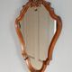 Louis XV style mirror, carved in polished solid wood. Shell pediment.