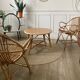 Fauteuil coquille en rotin vintage
