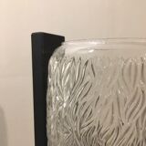 Black metal and molded glass wall sconce