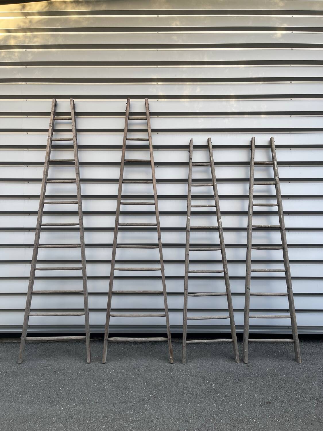 Lot 4 large painter's ladders carrying wood 1950