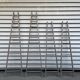 Lot 4 large painter's ladders carrying wood 1950