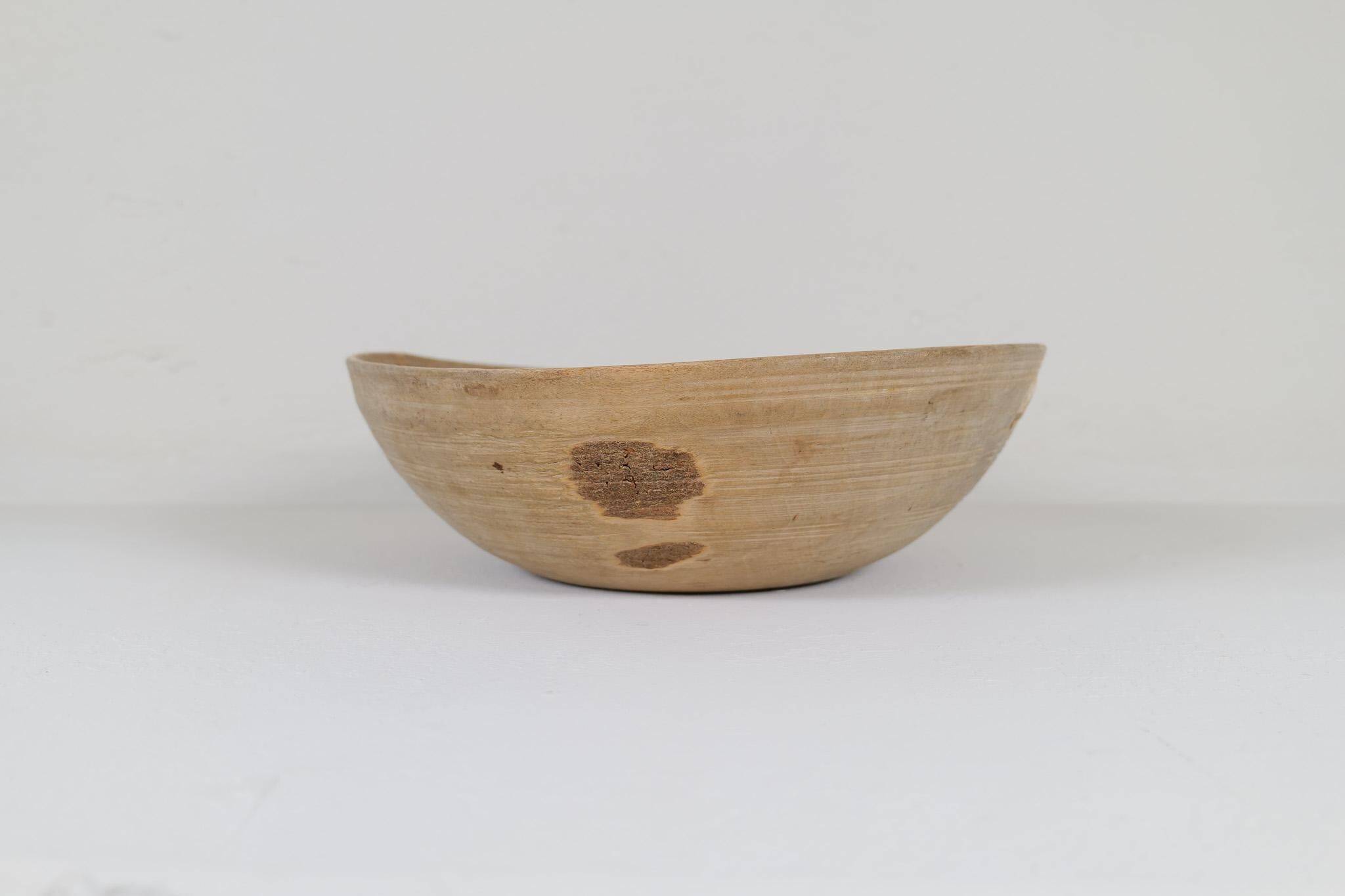 Set of three unique farmhouse bowls from 19th-century Swedish folk art.