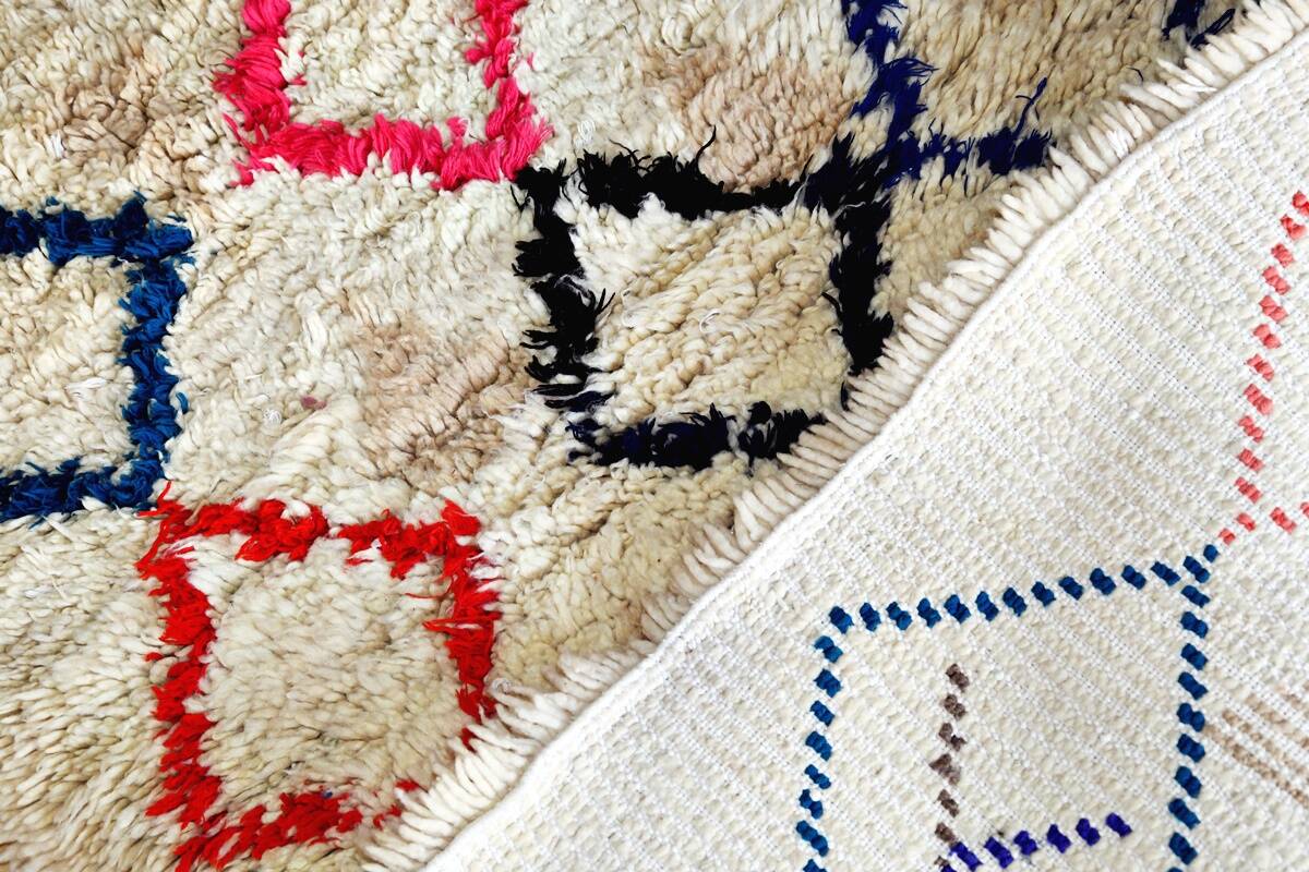 Small vintage beni ouarain rug