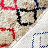 Small vintage beni ouarain rug