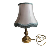 Vintage Neo-Rococo bedside lamp with fringed shade.