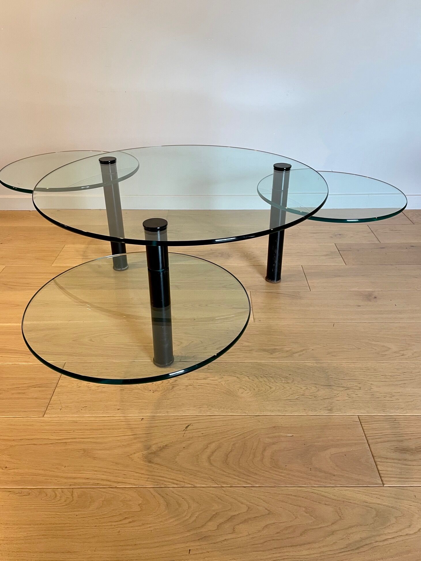 Glass coffee table and black base