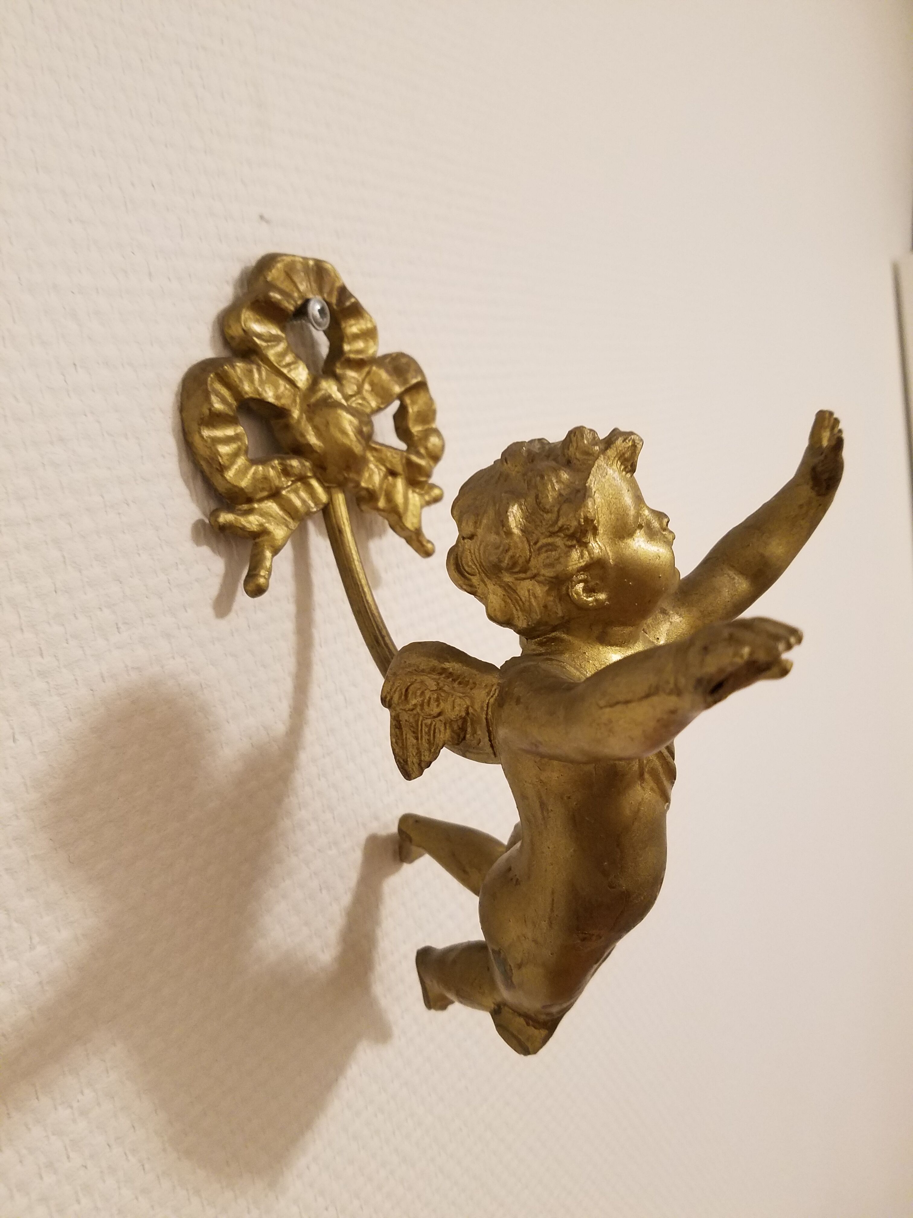 Hook in gilded bronze cherub or angelo