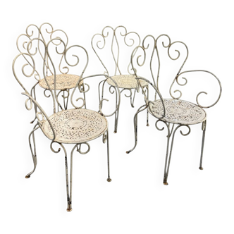Set of 4 white wrought iron garden chairs, 1950s.