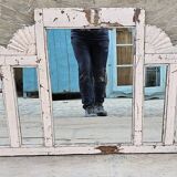 Old arched mirror in Burmese teak