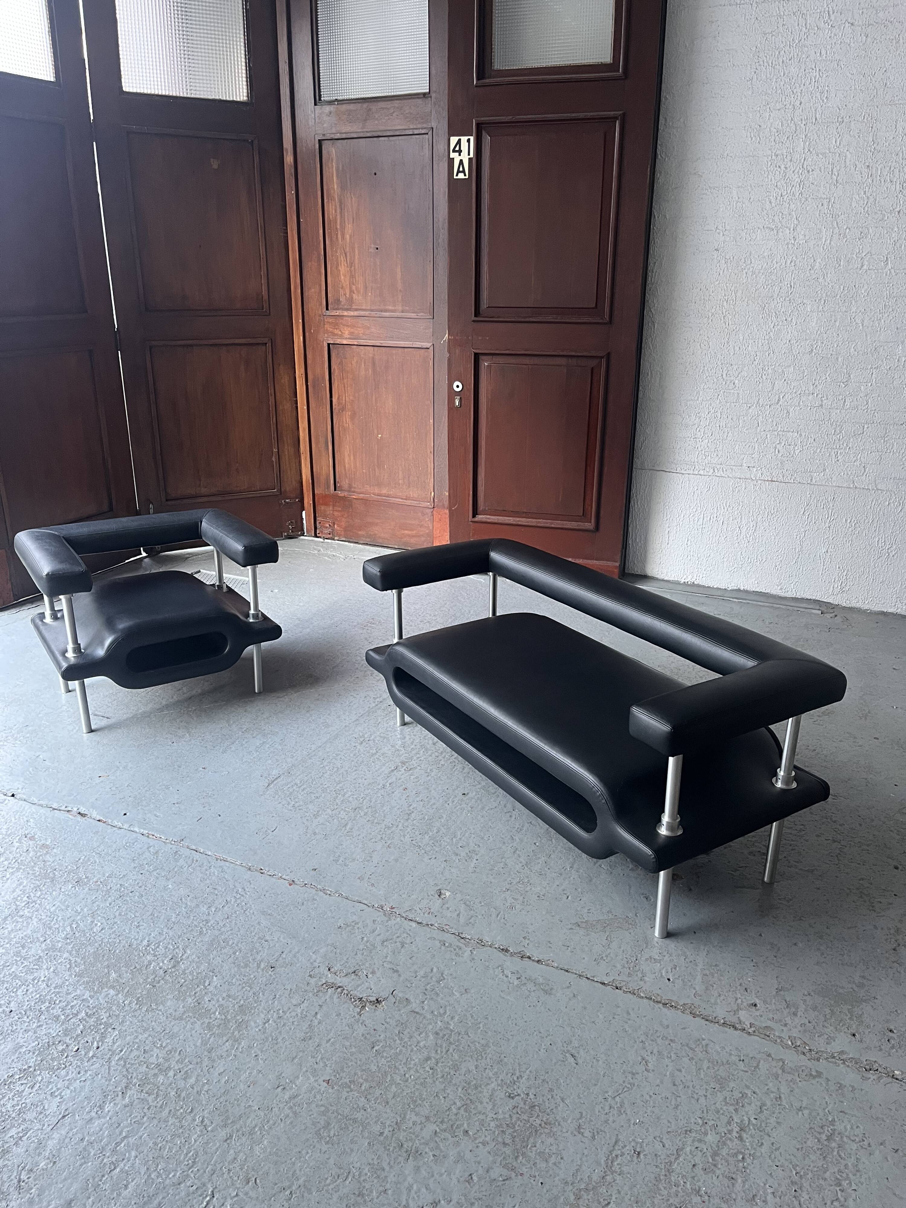 ‘Magazine’ easy chair and 2-seater by Michael Young