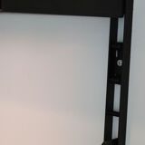 Shelves in rosewood and black lacquered metal from the 50s