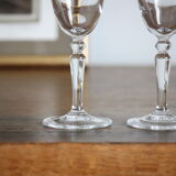 2 crystal champagne flutes of engraved arches