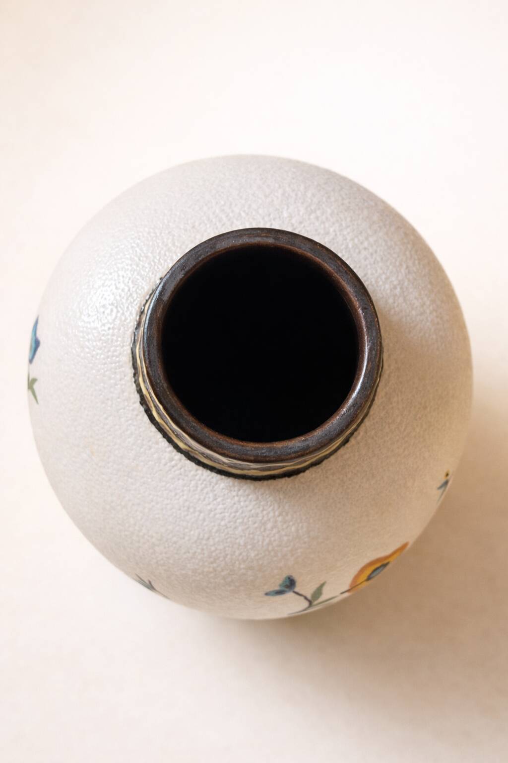 Art Deco vase by Louis Dage, frosted enamel and hand-painted floral decoration, years.