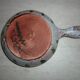 Frying pan with fat lava and ceramic fish decor