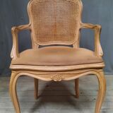 Louis XVI style caned armchair