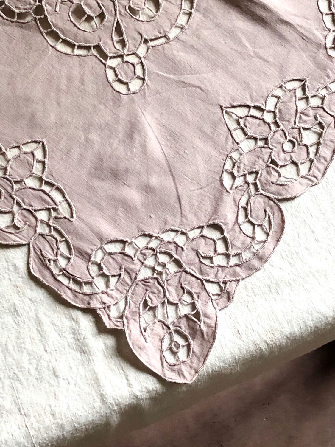 Old embroidered towel tinted purple aurora