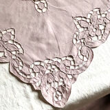 Old embroidered towel tinted purple aurora