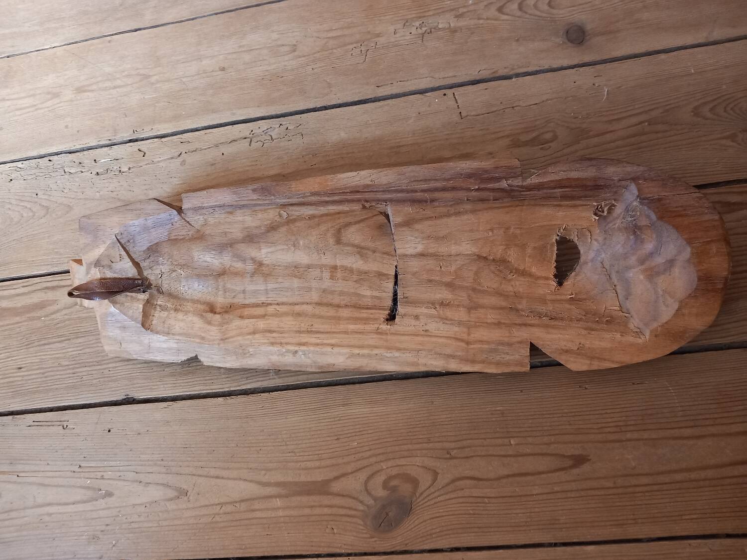 African mask in light wood