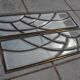 Deux vitraux en verre biseauté et laiton