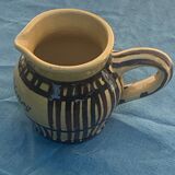 Vintage prince henry enamelled ceramic pitcher