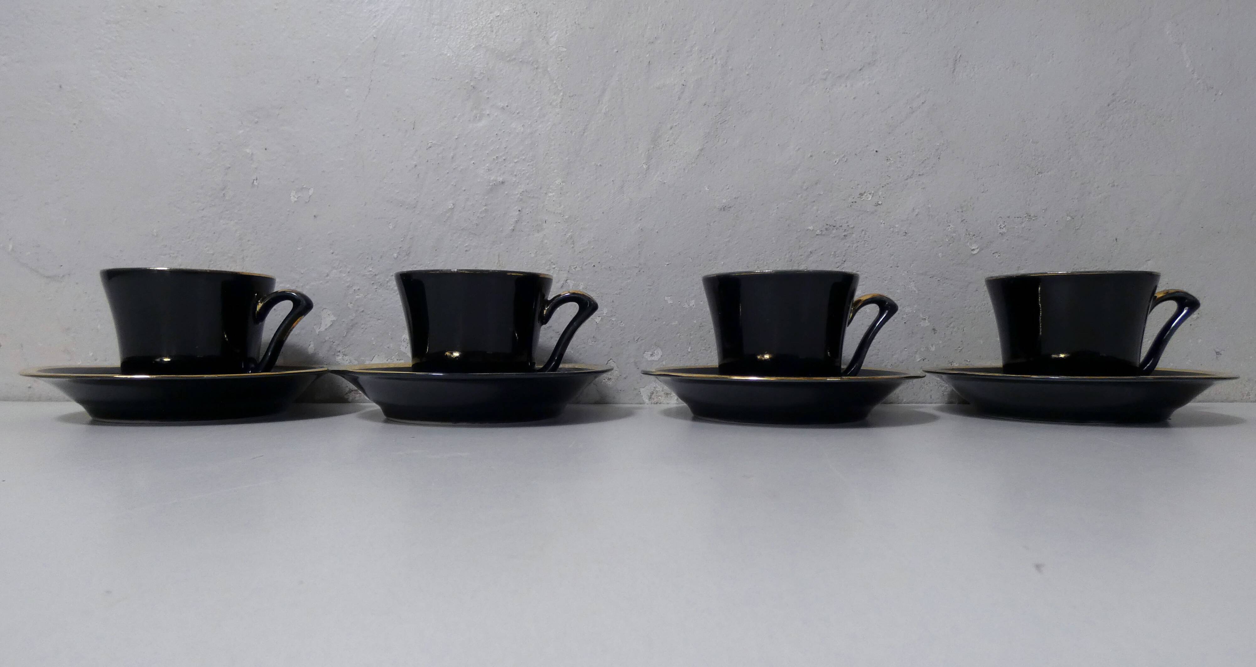 4 old black and gold cups in Vintage color