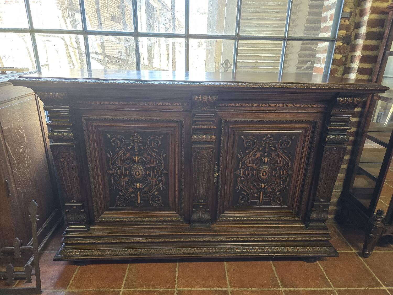 Renaissance style 2-door walnut sideboard