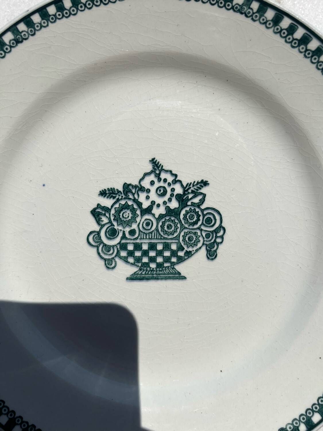 Vintage flat plate in green earthenware Manufacture Saint-Amand 4525 Basket of Flowers