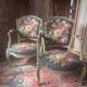 Pair of queen's armchairs with celadon green patina.