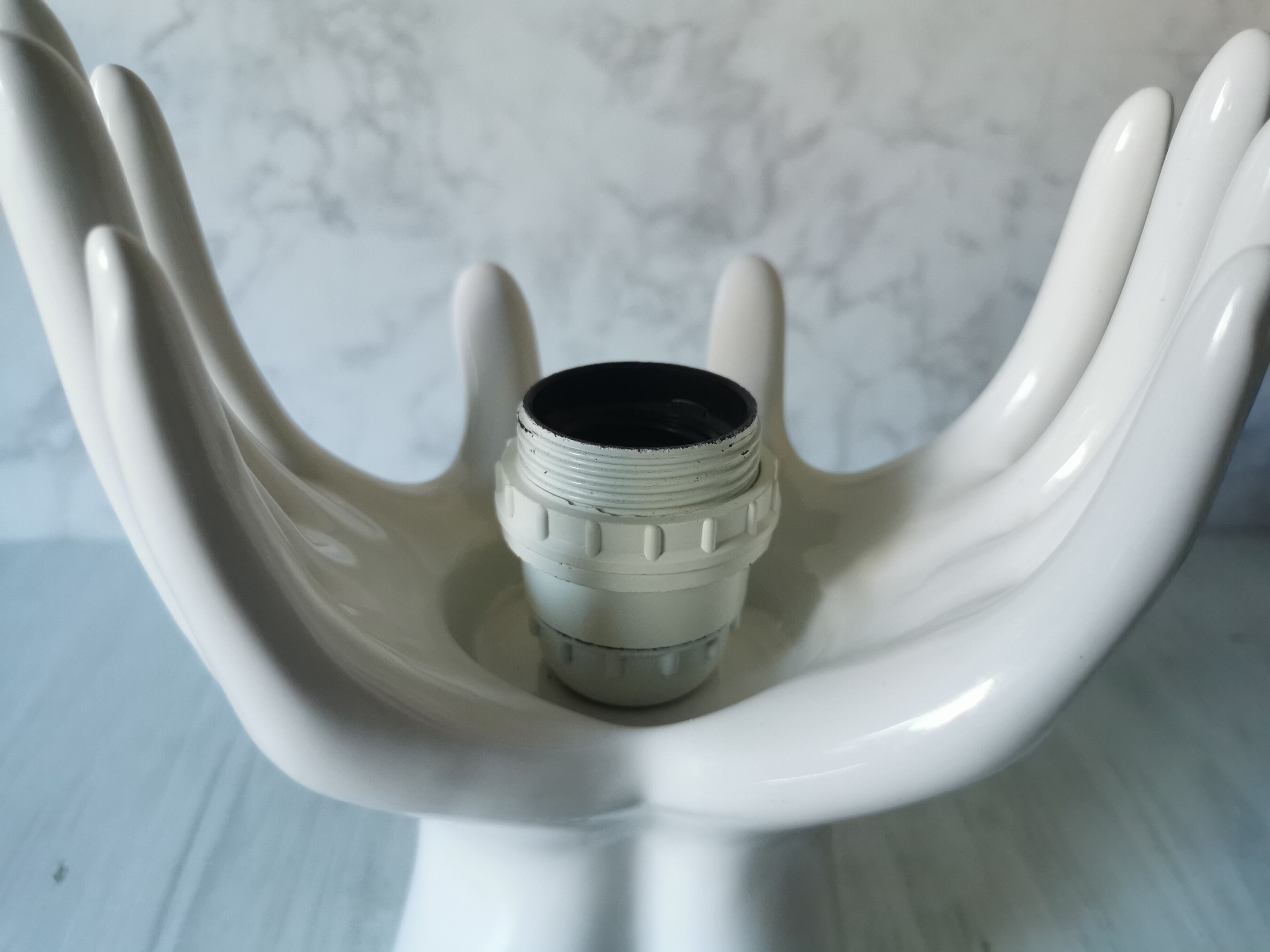 White ceramic hand lamp