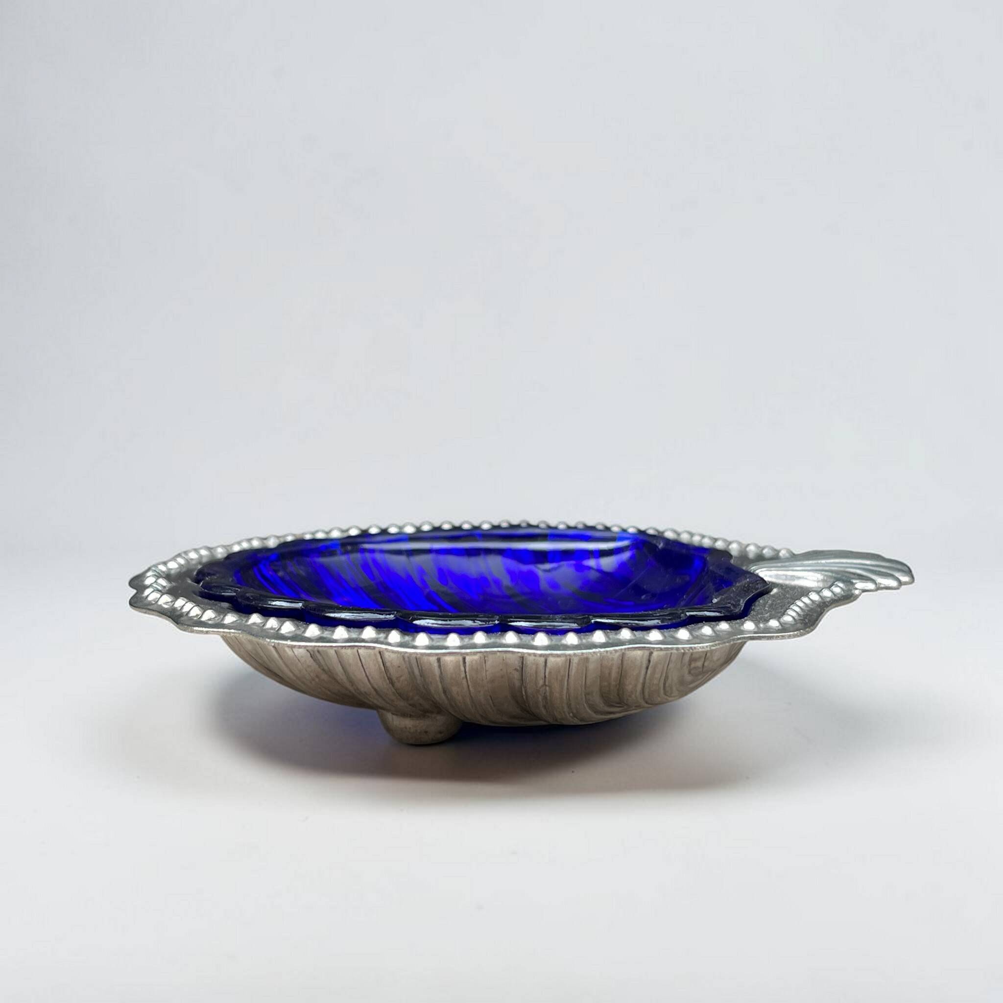 Silver-plated shell butter dish and vintage blue bowl from the 70s.