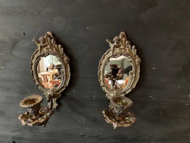 Pair of antique bronze candle holders