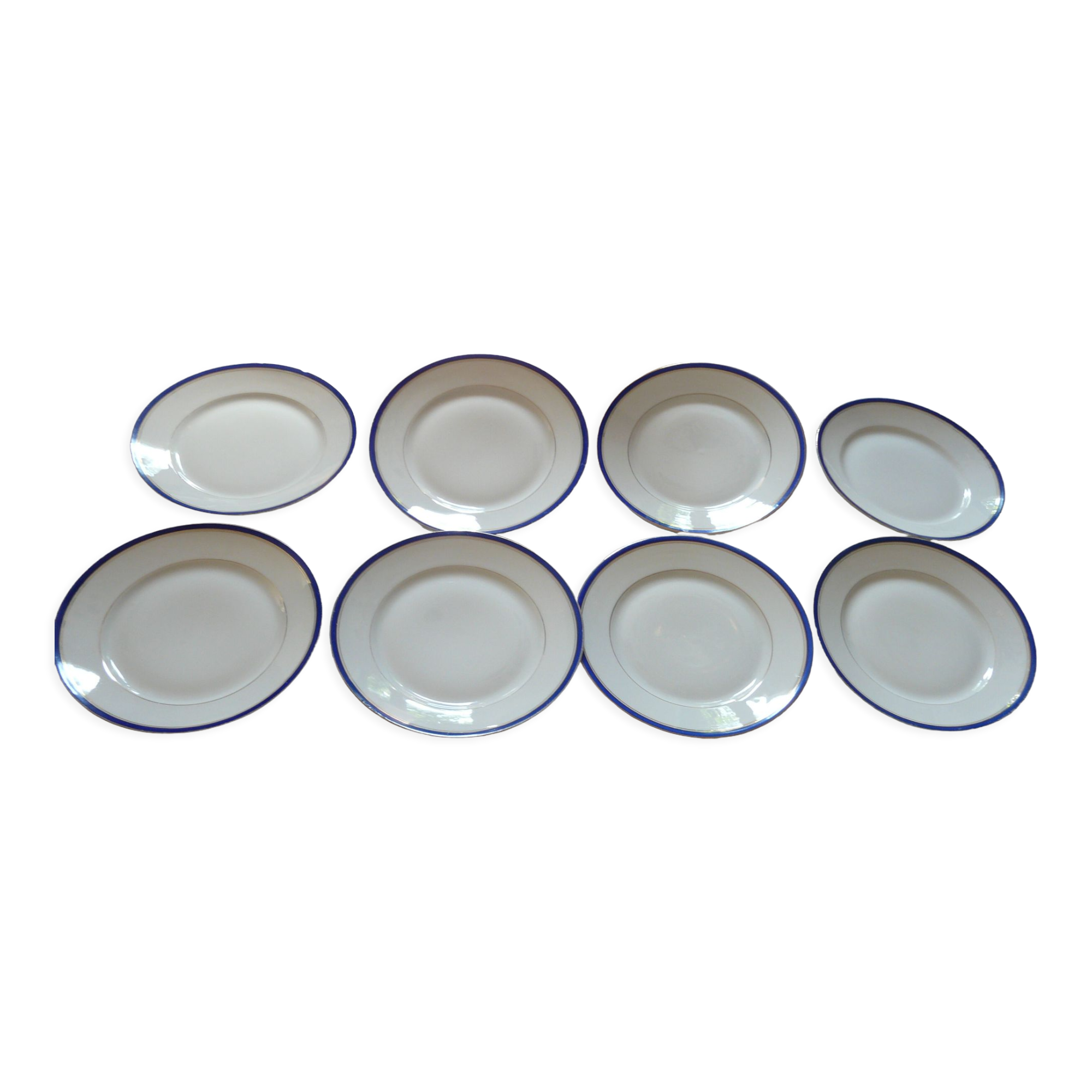 8 plates in Limoges porcelain gold and ultramarine blue fillets