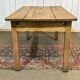 Extendable oak table from the 1930s with Gothic decoration.