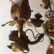 Two bronze wall light decorated with flowers in german porcelain
