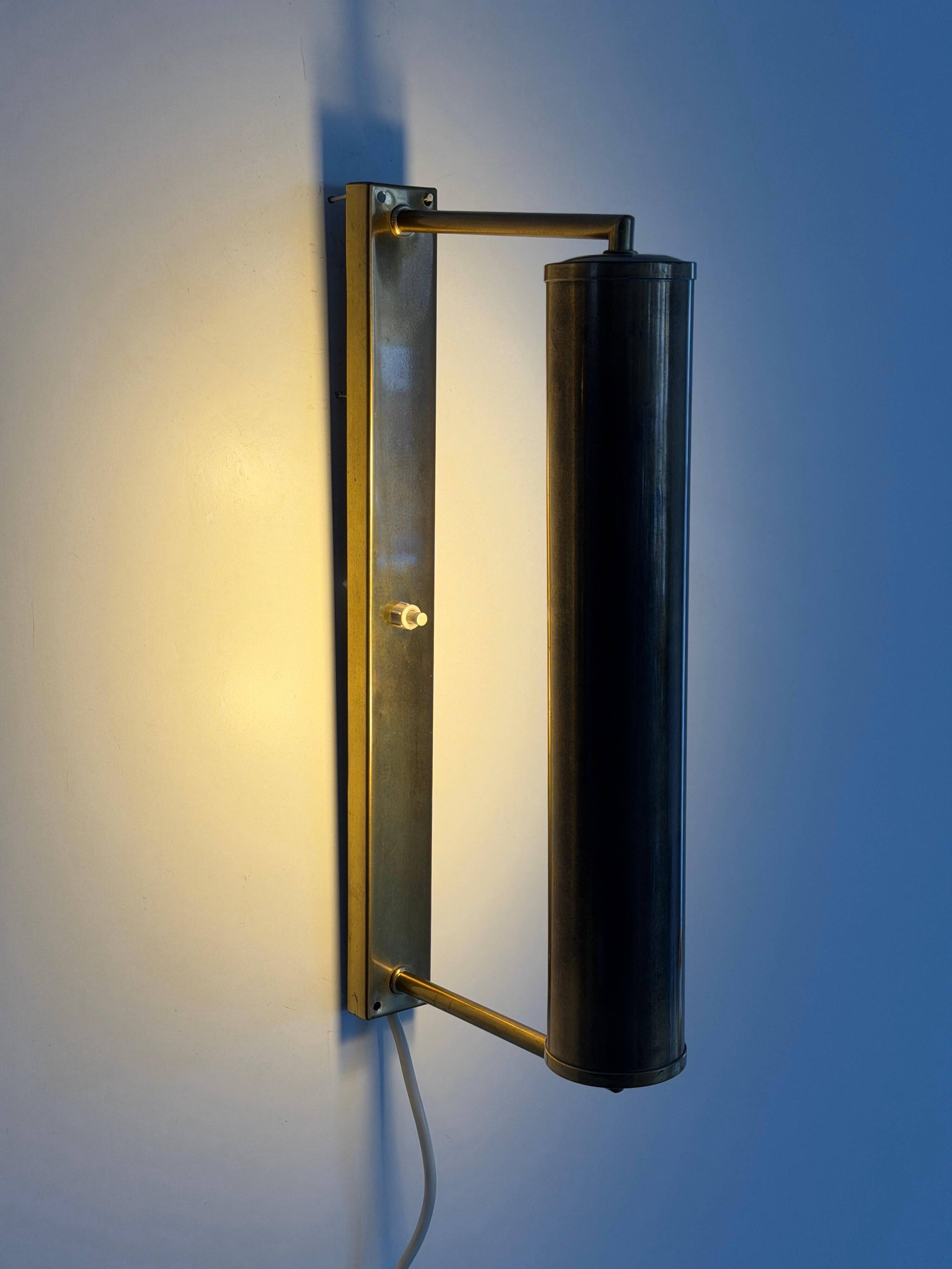Pair of brass wall lights with adjustable heads from the mid-20th century, 1960, Germany.