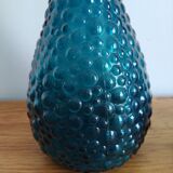 bottle made of blue vintage molded glass