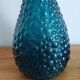 bottle made of blue vintage molded glass