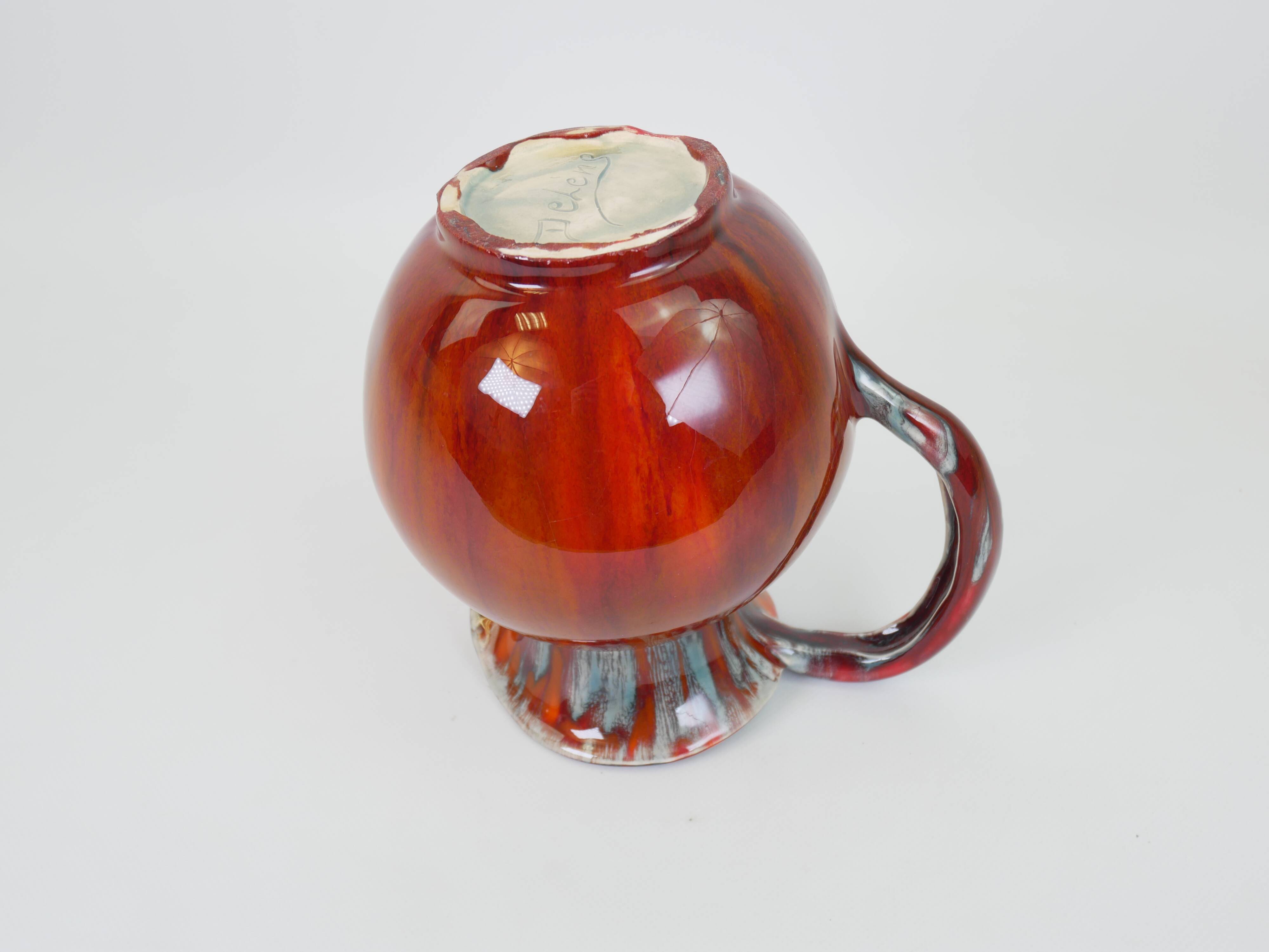 Pichet en céramique émaillée rouge et bleu signé Delène