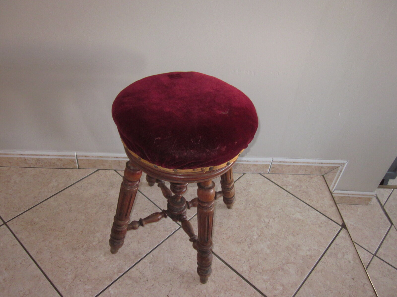Old piano stool