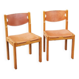 Pair of brutalist chairs in elm and stretched leather with saddle stitching Self publisher