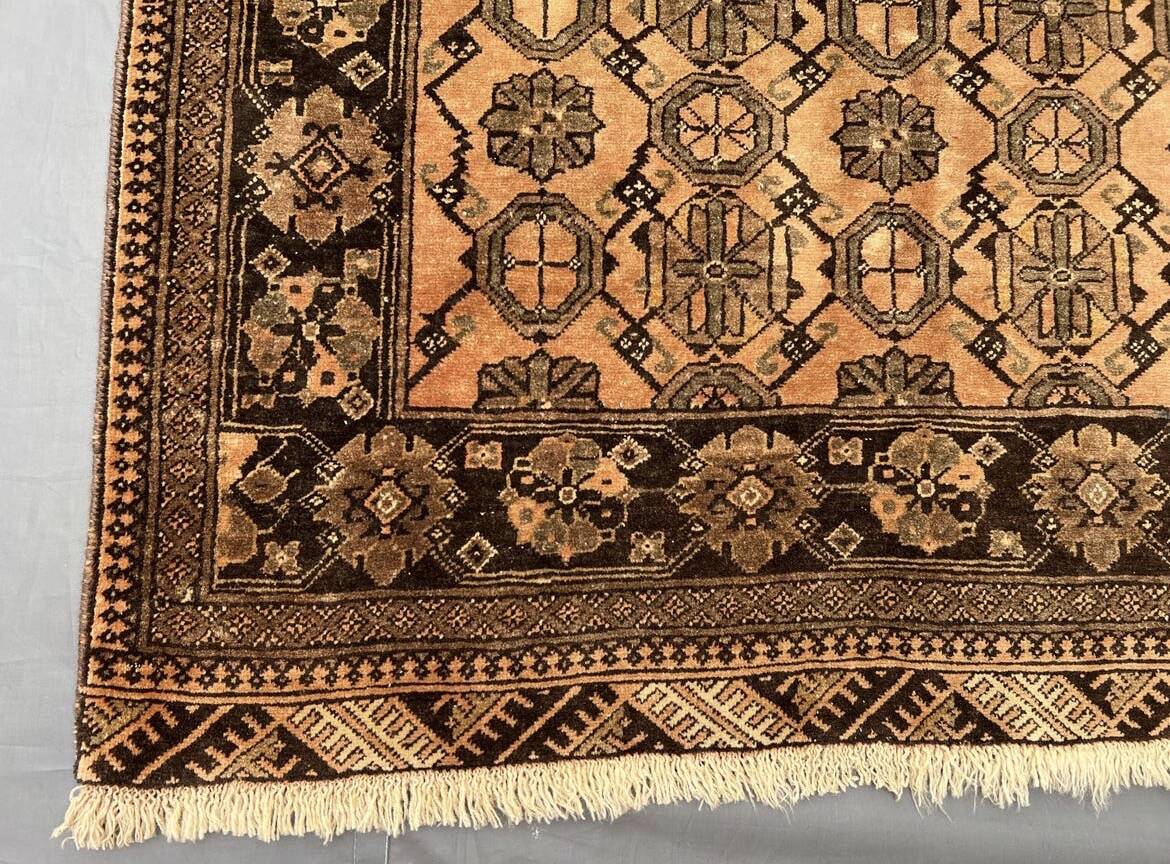 Old faded terracotta rug | Turkmen tribal wool rug