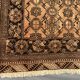 Old faded terracotta rug | Turkmen tribal wool rug