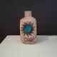 Vase bouteille céramique émaillée d'une fleur milieu XX ème . Ht 21,5 cm